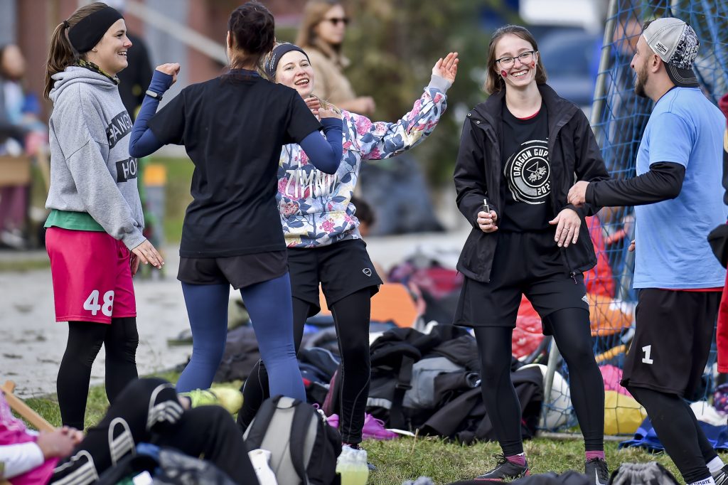 Dancing by the sidelines at the Ultimate Frisbee Hat Tournament