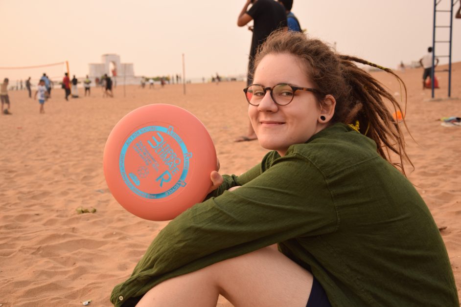 Women's Ultimate Frisbee Interview - Alina Stechert with a pink frisbee she got as a birthday gift in India